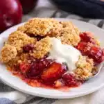 A delicious Plum Crumble Dessert with juicy fruit and a buttery crumb topping.